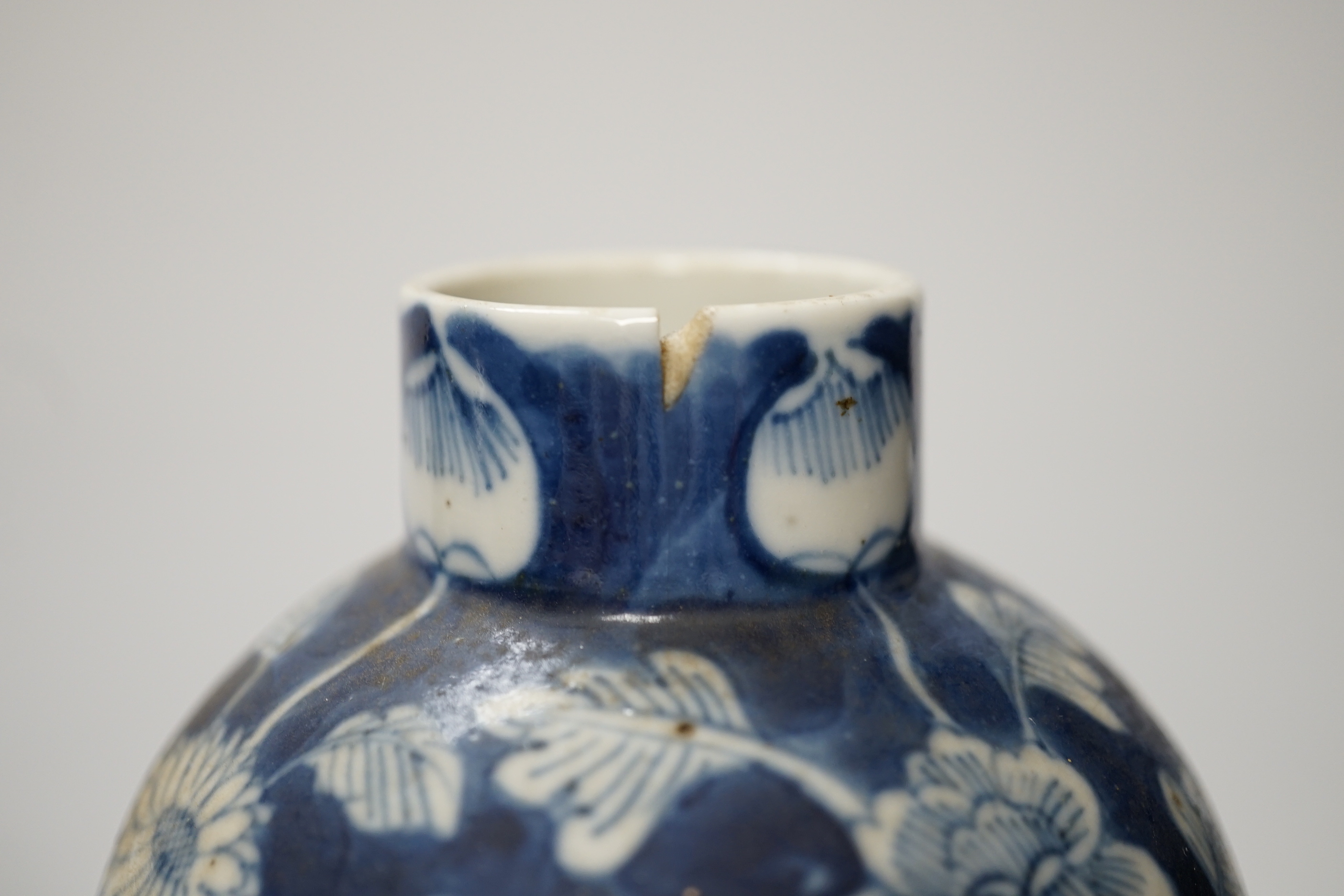 Three 19th century Chinese blue and white vases, tallest 23.5cm